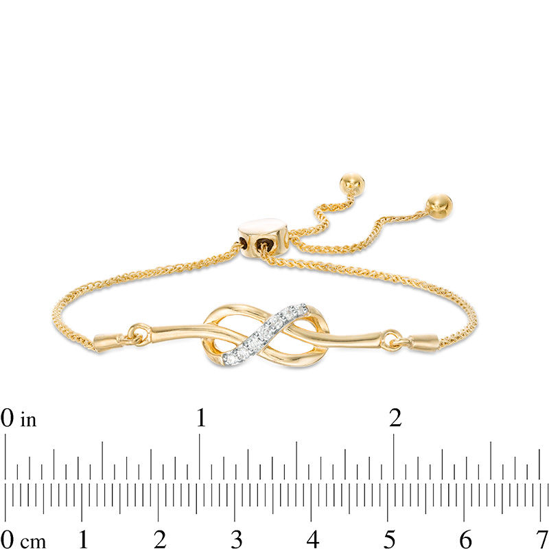 Main Image 2 of 0.145 CT. T.W. Diamond Infinity Knot Bolo Bracelet in Sterling Silver with 14K Gold Plate - 9.5"