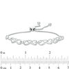 0.065 CT. T.W. Diamond Infinity Knot Bolo Bracelet in Sterling Silver - 9.5"