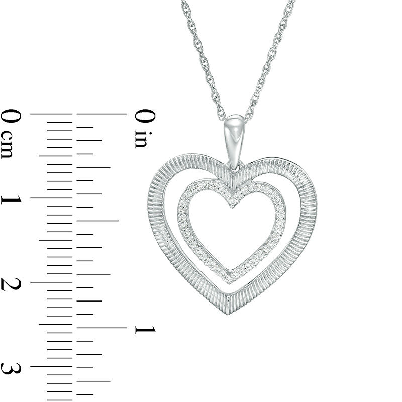 0.116 CT. T.W. Diamond and Textured Double Heart Pendant in Sterling Silver