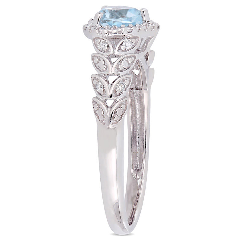 Main Image 2 of 5.0mm Heart-Shaped Sky Blue Topaz and 0.05 CT. T.W. Diamond Beaded Frame Leaf Shank Ring in 10K White Gold