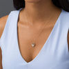 Thumbnail Image 1 of 0.18 CT. T.W. Composite Diamond Double Oval Frame Pendant in 10K Gold