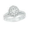Thumbnail Image 1 of 1.00 CT. T.W. Oval Diamond Double Scallop Frame Bridal Set in 14K White Gold