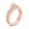 Thumbnail Image 2 of Perfect Fit 0.50 CT. T.W. Baguette and Round Diamond Frame Interlocking Bridal Set in 14K Rose Gold