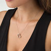 Thumbnail Image 1 of Lab-Created White Sapphire Tilted Double Heart Outline Pendant in Sterling Silver and 10K Rose Gold
