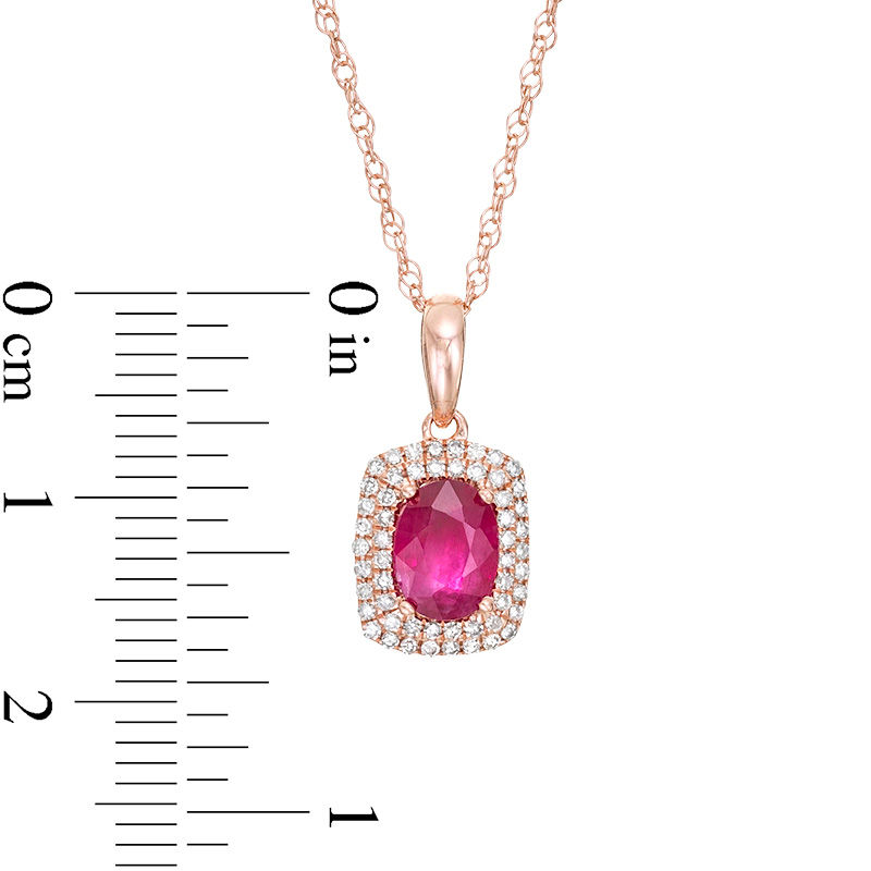 Oval Ruby and 0.15 CT. T.W. Diamond Cushion-Shaped Double Frame Pendant in 10K Rose Gold