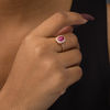 Thumbnail Image 1 of Oval Ruby and 0.15 CT. T.W. Diamond Double Cushion Frame Ring in 10K Rose Gold