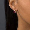 Thumbnail Image 1 of Oval Ruby and 0.23 CT. T.W. Diamond Double Cushion Frame Stud Earrings in 10K Rose Gold