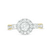 0.95 CT. T.W. Diamond Frame Three Stone Engagement Ring in 10K Gold