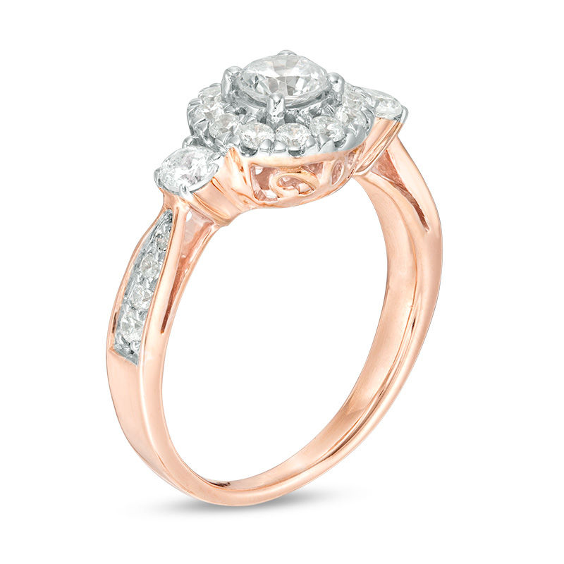 0.95 CT. T.W. Diamond Frame Three Stone Engagement Ring in 10K Rose Gold