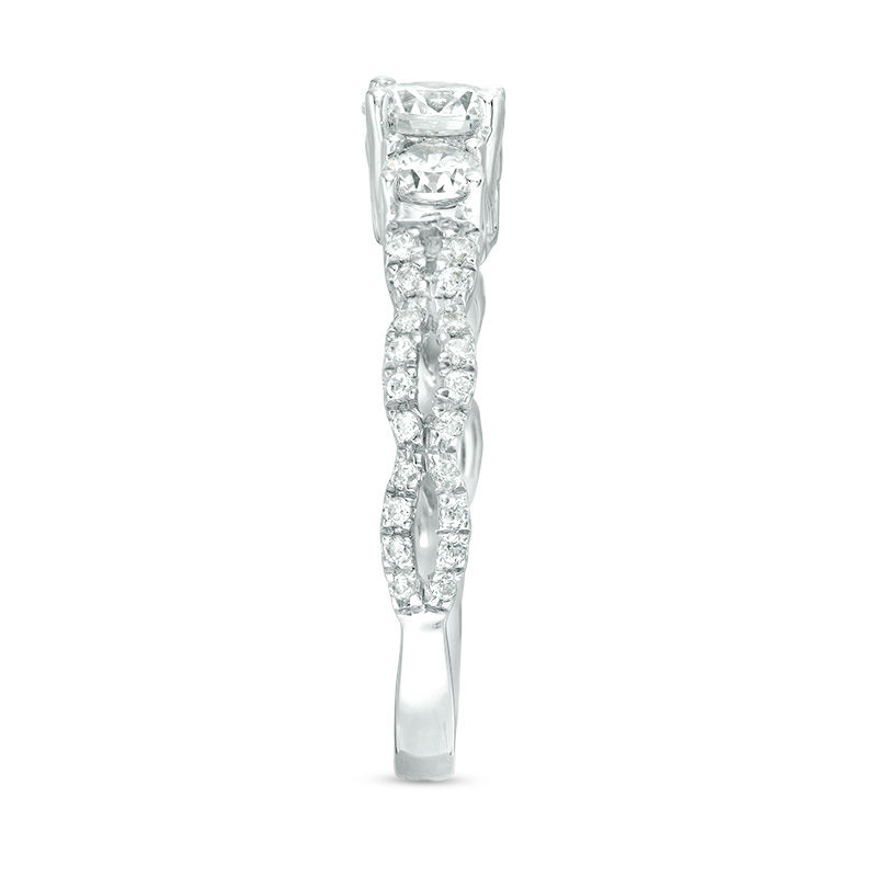 0.95 CT. T.W. Diamond Three Stone Braid Engagement Rink in 10K White Gold