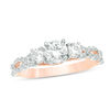 Thumbnail Image 0 of 0.95 CT. T.W. Diamond Three Stone Braid Engagement Ring in 10K Rose Gold