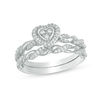 Thumbnail Image 0 of 0.22 CT. T.W. Diamond Heart Shape Frame Twist Bridal Set in 10K White Gold