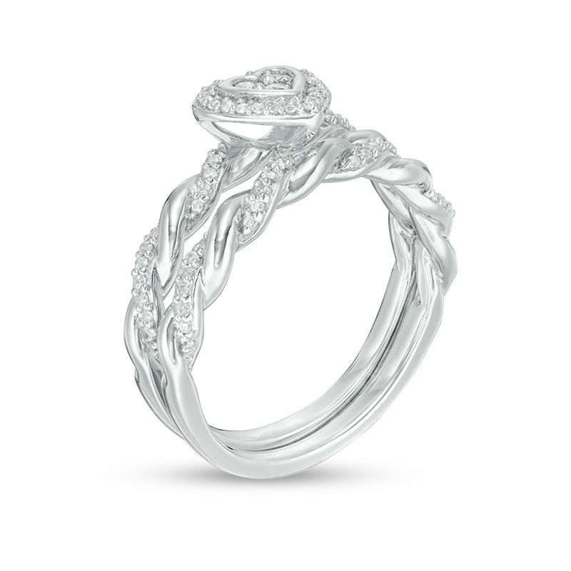 0.22 CT. T.W. Diamond Heart Shape Frame Twist Bridal Set in 10K White Gold