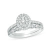 Thumbnail Image 0 of 0.45 CT. T.W. Composite Oval Diamond Double Frame Bridal Set in 10K White Gold