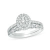 Thumbnail Image 1 of 0.45 CT. T.W. Composite Oval Diamond Double Frame Bridal Set in 10K White Gold