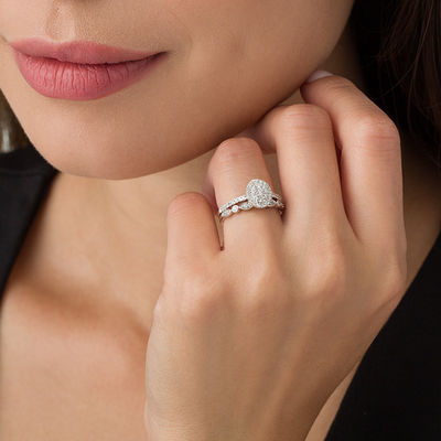 0.45 CT. T.W. Composite Oval Diamond Double Frame Bridal Set in 10K White Gold