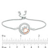 Thumbnail Image 1 of 0.065 CT. T.W. Diamond Open Circle Paw Print Bolo Bracelet in Sterling Silver and 10K Rose Gold - 9.5"