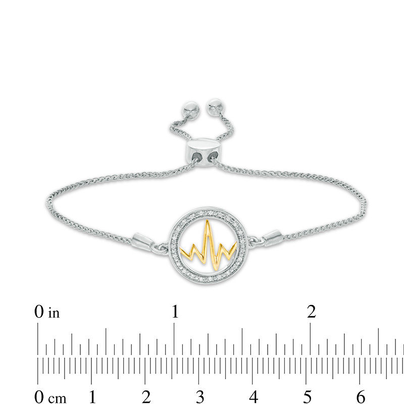 0.066 CT. T.W. Diamond Open Circle Heartbeat Bolo Bracelet in Sterling Silver and 10K Gold - 9.5"