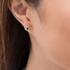 Thumbnail Image 1 of 3.0mm Blue Sapphire and 0.07 CT. T.W. Diamond Love Knot Frame Stud Earrings in 10K Gold