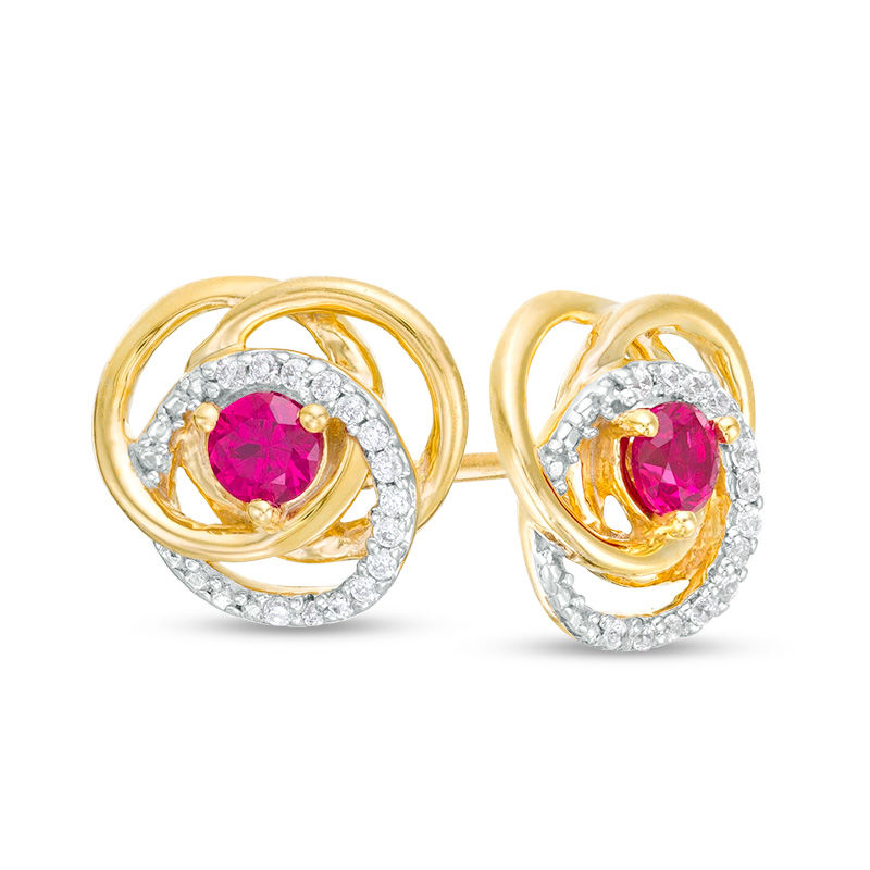 3.0mm Ruby and 0.07 CT. T.W. Diamond Love Knot Frame Stud Earrings in 10K Gold