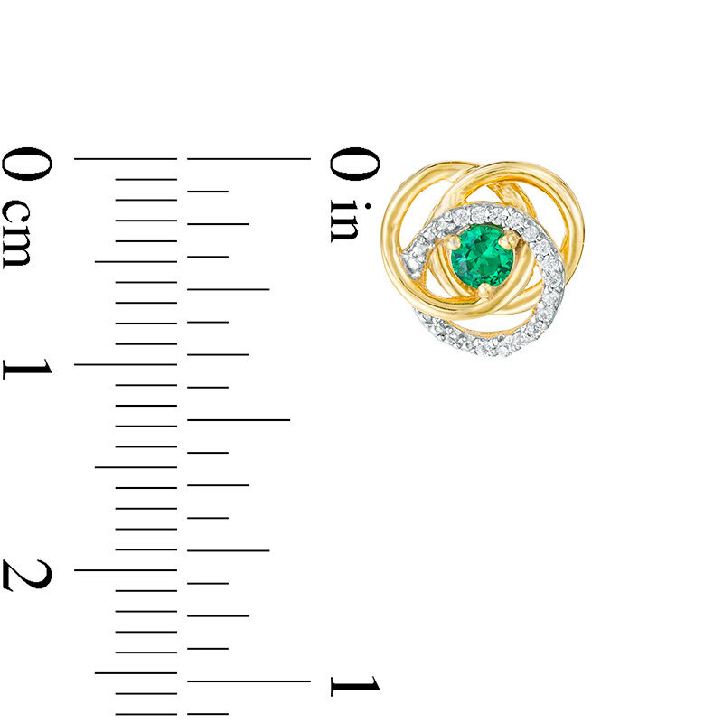Main Image 3 of 3.0mm Emerald and 0.07 CT. T.W. Diamond Love Knot Frame Stud Earrings in 10K Gold