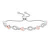 Thumbnail Image 0 of 0.04 CT. T.W. Diamond Sideways Heart and Flame Link Bolo Bracelet in Sterling Silver and 10K Rose Gold - 9.5"