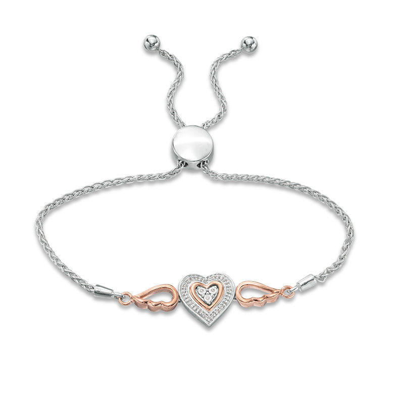 0.066 CT. T. W. Composite Diamond Double Heart Winged Bolo Bracelet in Sterling Silver and 10K Rose Gold - 9.5"