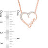 Thumbnail Image 1 of 0.066 CT. T.W. Diamond Heart "Love" Necklace in 10K Rose Gold