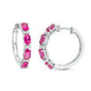 Thumbnail Image 0 of Oval Lab-Created Ruby and White Sapphire Hoop Earrings in Sterling Silver