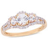Thumbnail Image 0 of 5.0mm Lab-Created White Sapphire and 0.10 CT. T.W. Diamond Frame Three Stone Ring in 10K Rose Gold