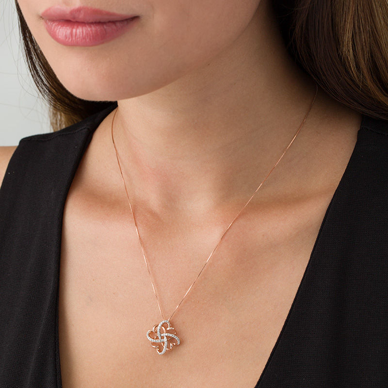Main Image 2 of 0.145 CT. T.W. Diamond Clover Heart Knot Pendant in 10K Rose Gold