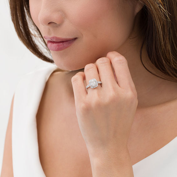 0.85 CT. T.W. Composite Baguette and Round Diamond Frame Engagement Ring in 14K White Gold