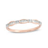 Thumbnail Image 0 of 0.05 CT. T.W. Baguette and Round Diamond Station Band in 10K Rose Gold