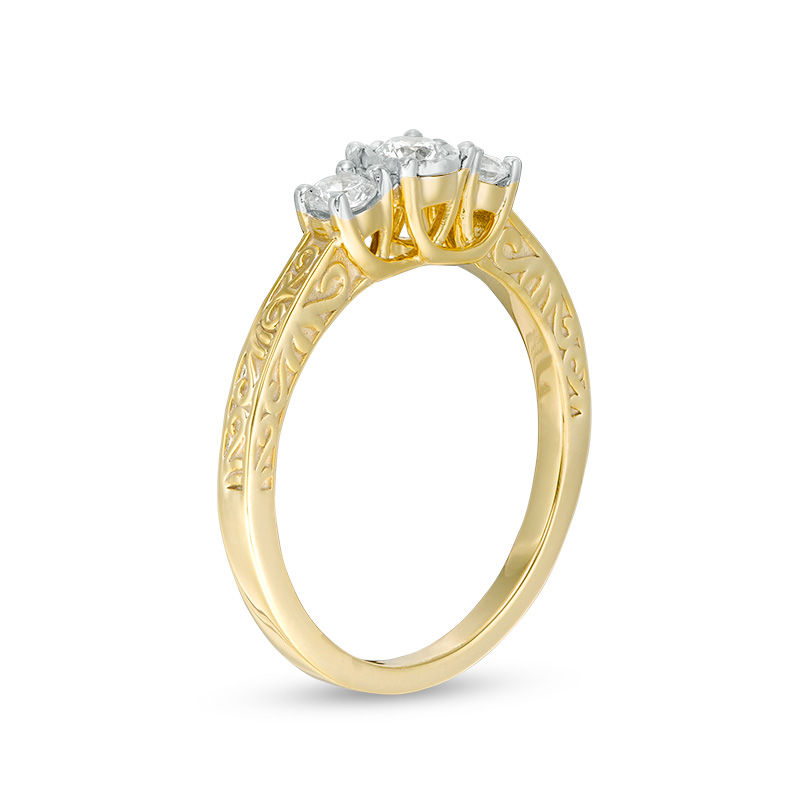 CT. T.W. Diamond Three Stone Filigree Scroll Engagement Ring in 10K Gold