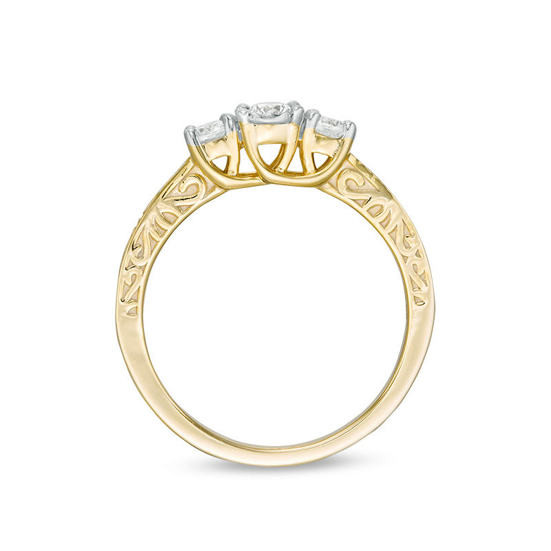 CT. T.W. Diamond Three Stone Filigree Scroll Engagement Ring in 10K Gold