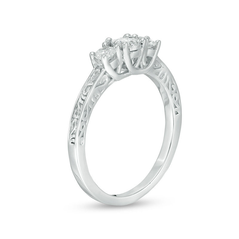 0.29 CT. T.W. Diamond Three Stone Filigree Scroll Engagement Ring in 10K White Gold