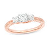 Thumbnail Image 0 of 0.29 CT. T.W. Diamond Three Stone Filigree Scroll Engagement Ring in 10K Rose Gold