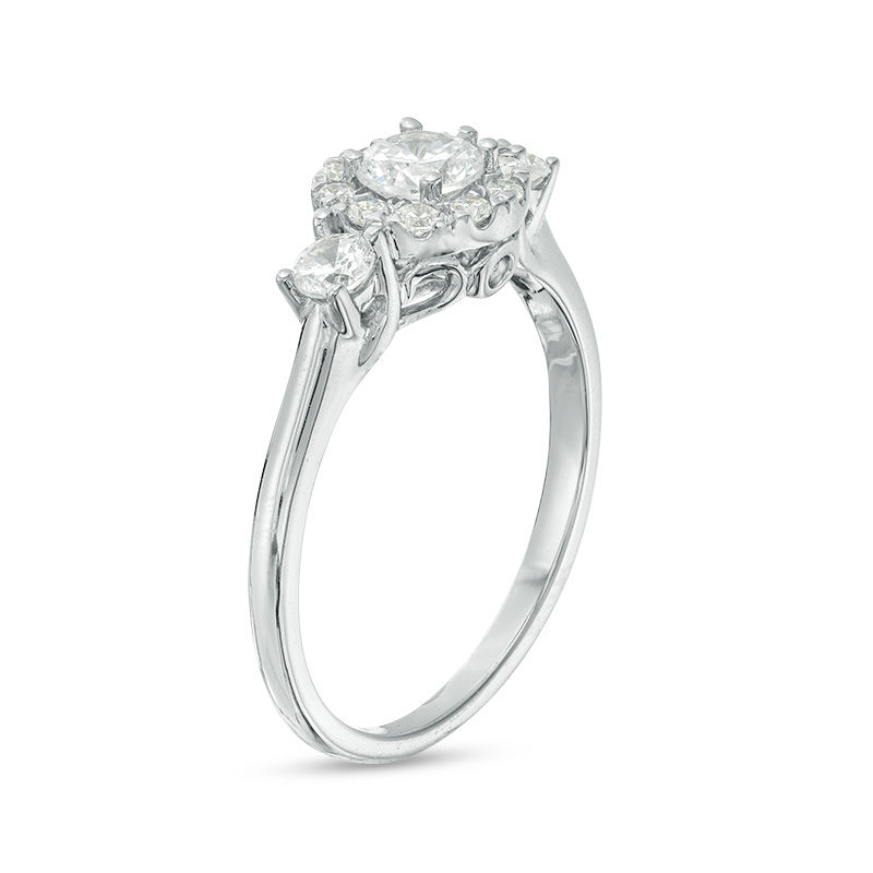 0.69 CT. T.W. Diamond Three Stone Frame Engagement Ring in 10K White Gold