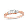 Thumbnail Image 0 of 0.45 CT. T.W. Diamond Three Stone Filigree Scroll Engagement Ring in 10K Rose Gold