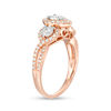 Thumbnail Image 1 of 0.70 CT. T.W. Diamond Past Present Future® Pear-Shaped Frame Twist Engagement Ring in 10K Rose Gold