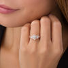 Thumbnail Image 3 of 0.70 CT. T.W. Diamond Past Present Future® Pear-Shaped Frame Twist Engagement Ring in 10K Rose Gold