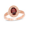 Thumbnail Image 0 of Oval Garnet and 0.085 CT. T.W. Diamond Frame Vintage-Style Ring in 10K Rose Gold