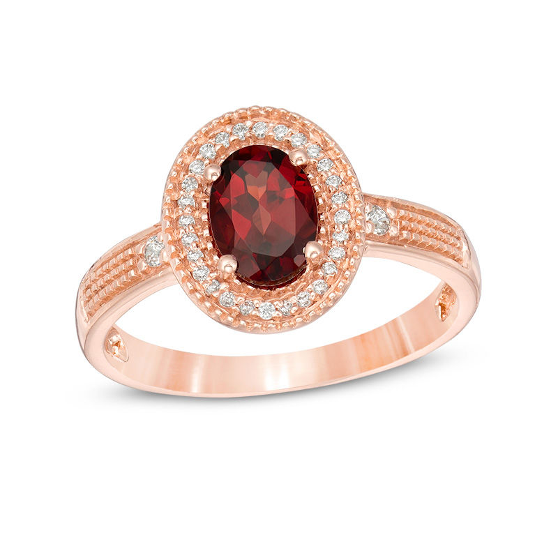 Oval Garnet and 0.085 CT. T.W. Diamond Frame Vintage-Style Ring in 10K Rose Gold