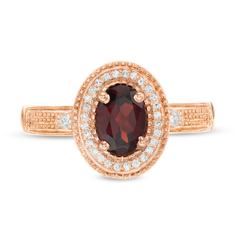 Main Image 4 of Oval Garnet and 0.085 CT. T.W. Diamond Frame Vintage-Style Ring in 10K Rose Gold