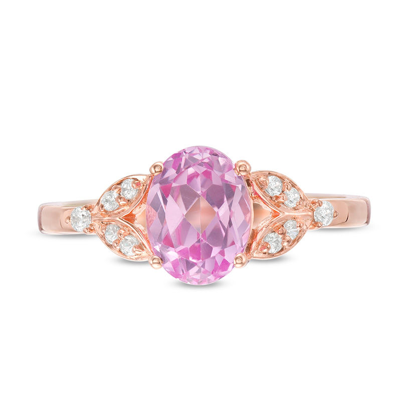 Oval Lab-Created Pink Sapphire and 0.086 CT. T.W. Diamond Leaf Sides Ring in 10K Rose Gold