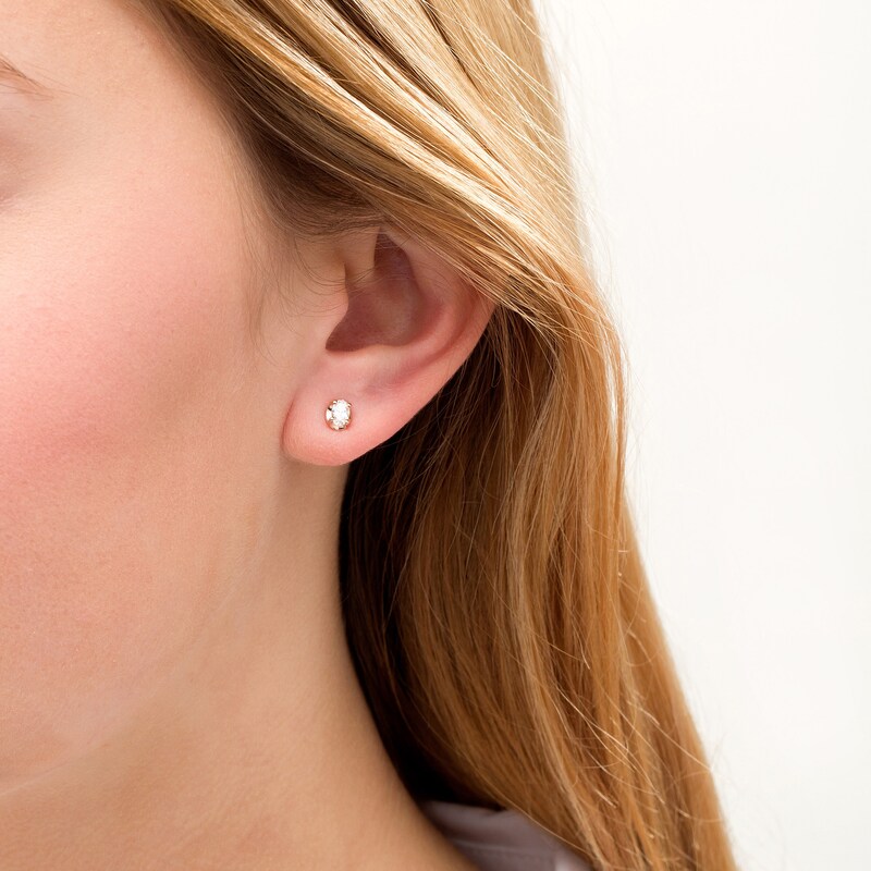 Main Image 2 of 0.45 CT. T. W. Oval Diamond Solitaire Stud Earrings in 10K Rose Gold