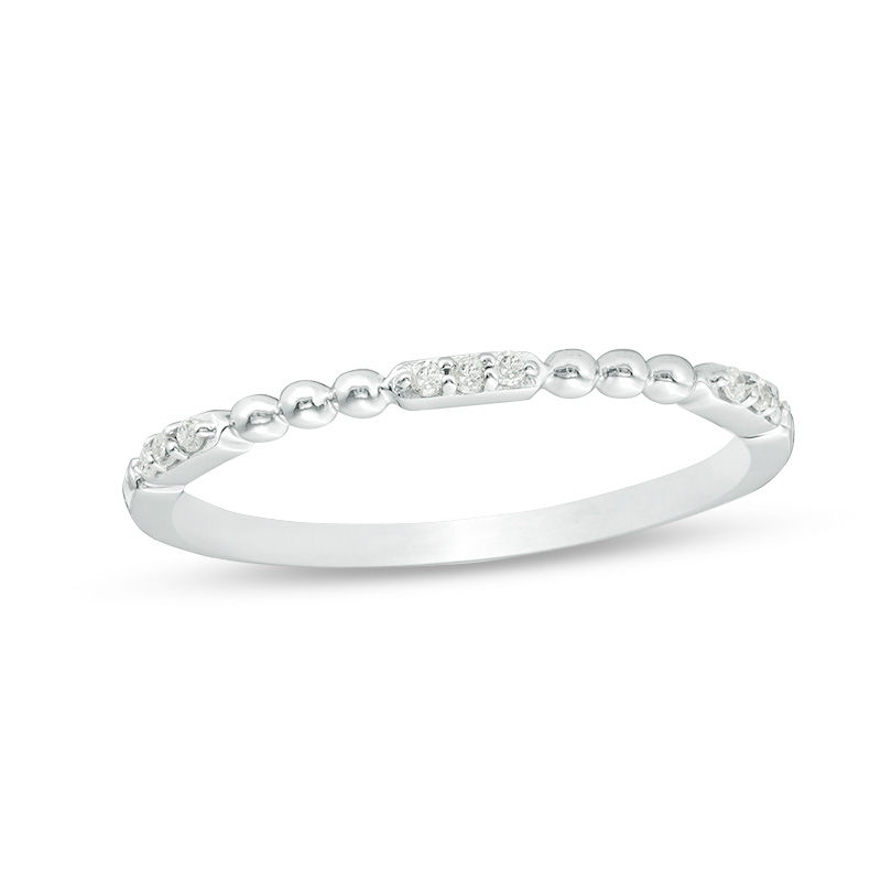 0.05 CT. T.W. Diamond and Beaded Station Anniversary Band in 10K White Gold