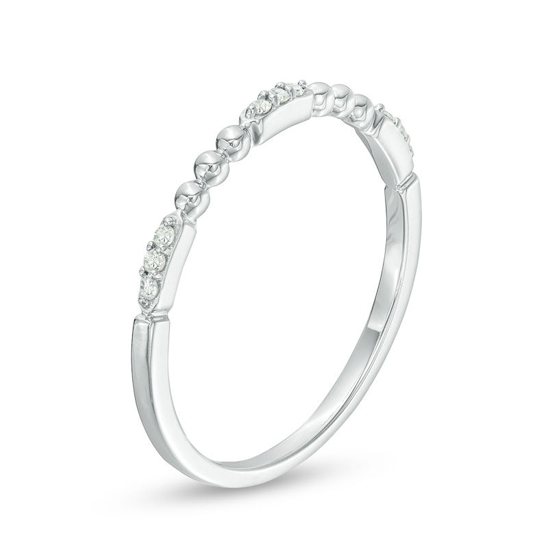 0.05 CT. T.W. Diamond and Beaded Station Anniversary Band in 10K White Gold