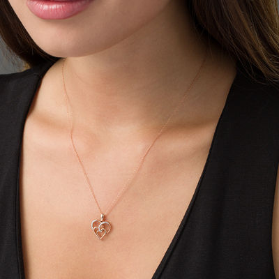 0.07 CT. T.W. Diamond Triple Swirl Heart Pendant in 10K Rose Gold