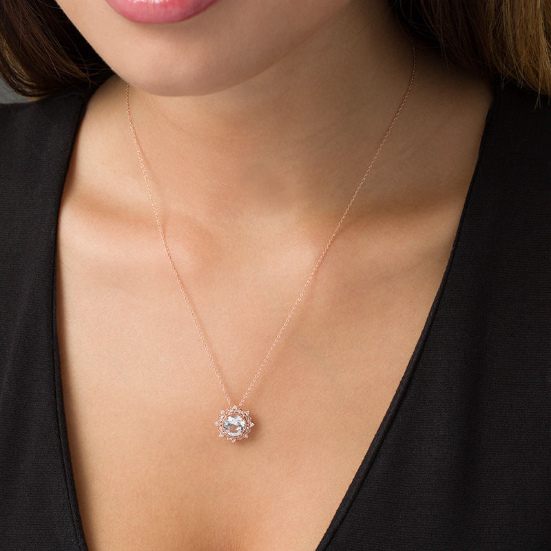 8.0mm Lab-Created White Sapphire and 0.145 CT. T.W. Diamond Sunburst Frame Vintage-Style Pendant in 10K Rose Gold